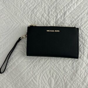 Michael Kors wristlet black never used